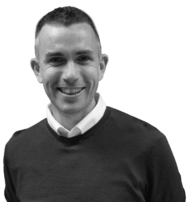 Andrew Elias smiling at an education event